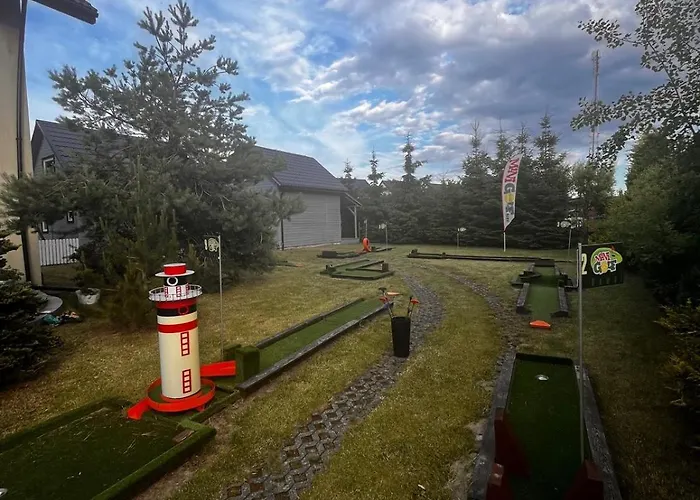 Domek letniskowy Kapitańskie Z Prywatnym Polem Do Gry W Mini Golf Rewal